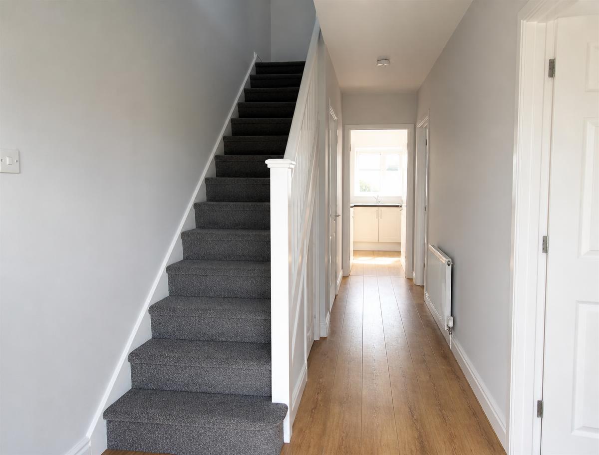 Empty rental property hallway and stairs cleaned ready for new tenants